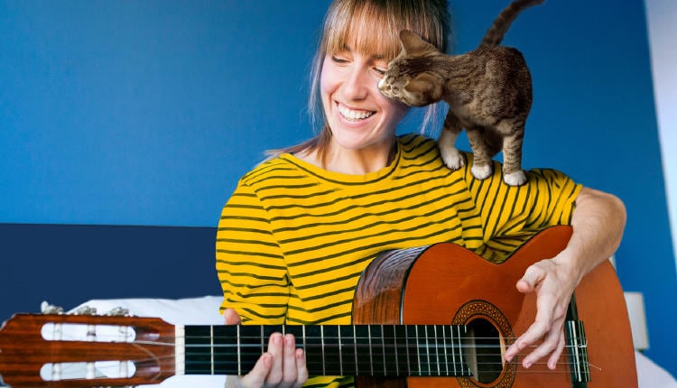 Woman playing guitar